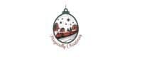 The logo for Magically Christmas website that is an ornament with a train in the middle of it.
