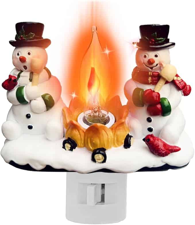 Two snowmen sitting by a campfire that is a nightlight.