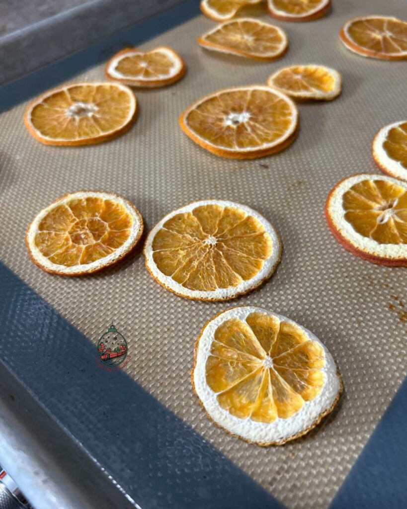 Close up of dried orange slices that have been dried in the oven.