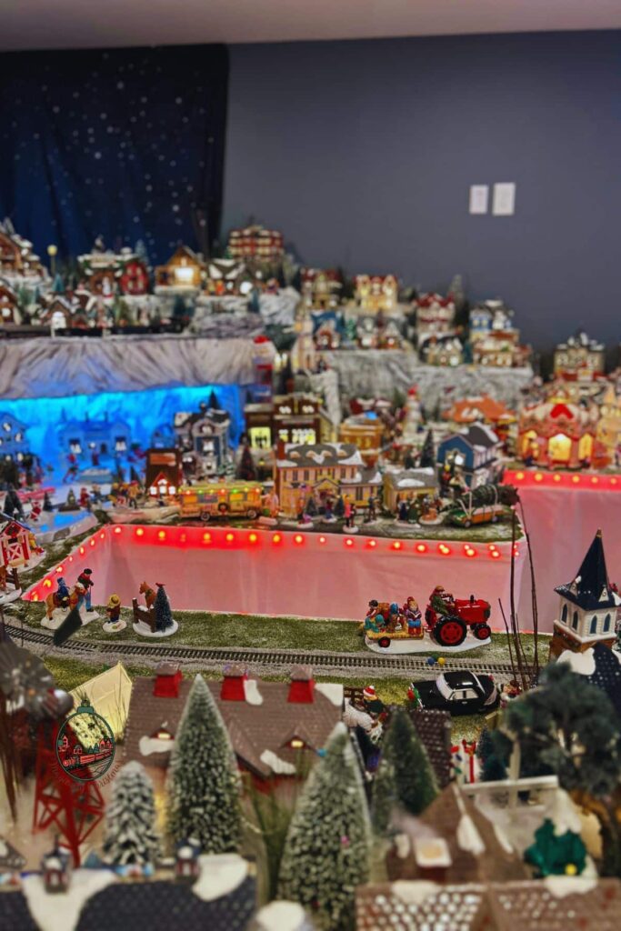 Looking at some of the Christmas village that show the mountain area in the background.