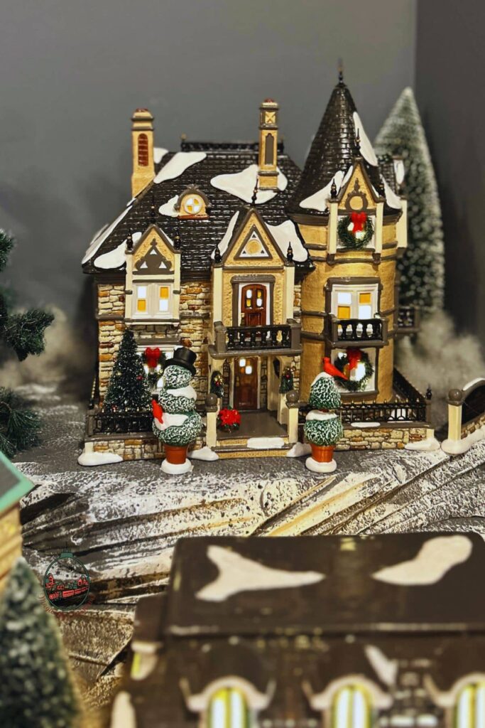 Close up of the Mayor's Mansion in Frosty Falls Christmas Village.