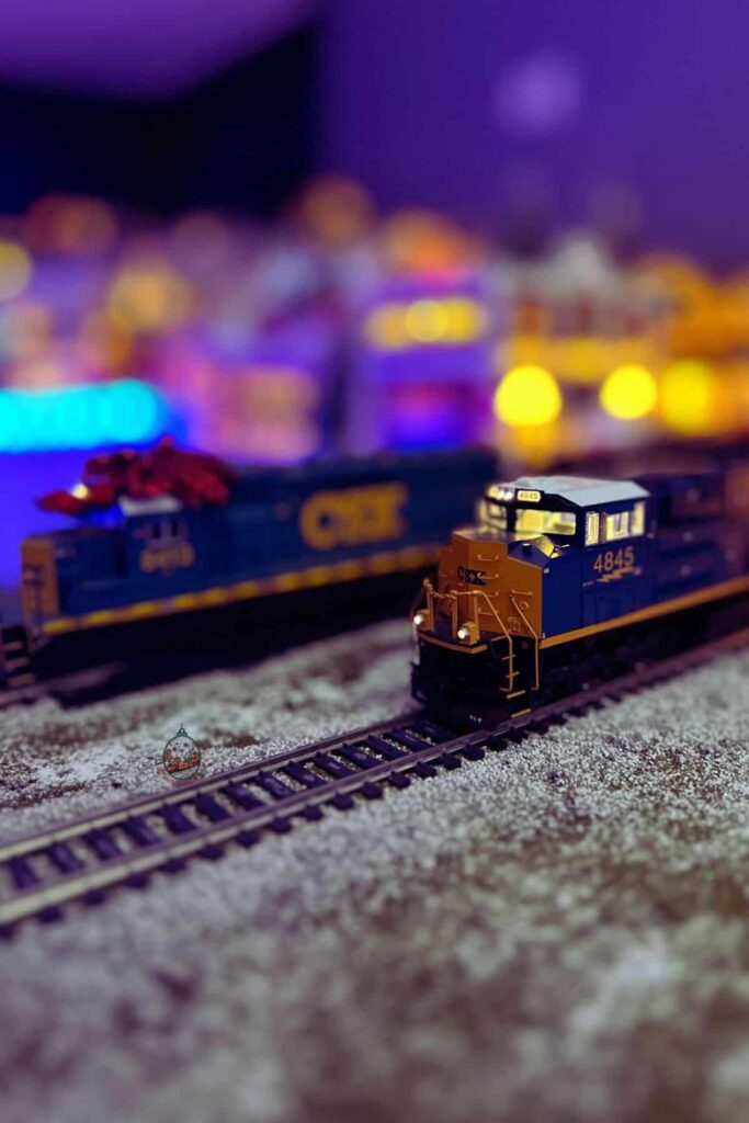 Two ho scale locomotives that run around Frosty Falls Christmas Village.